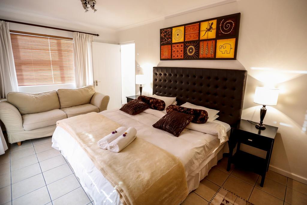 Secret Garden Guesthouse Bloubergstrand Oda fotoğraf
