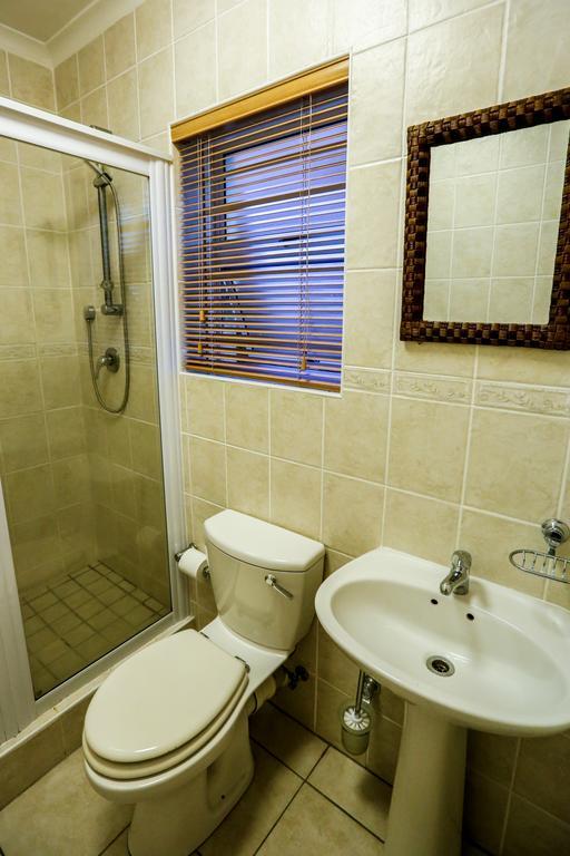 Secret Garden Guesthouse Bloubergstrand Oda fotoğraf