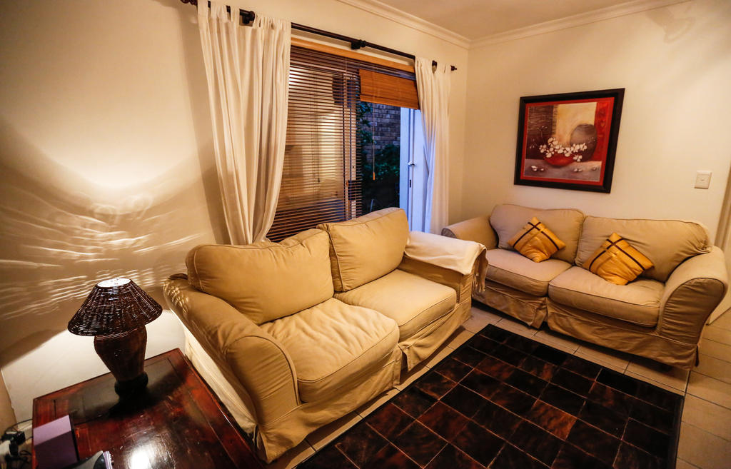 Secret Garden Guesthouse Bloubergstrand Oda fotoğraf