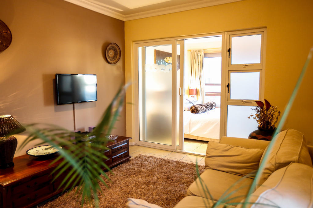 Secret Garden Guesthouse Bloubergstrand Oda fotoğraf
